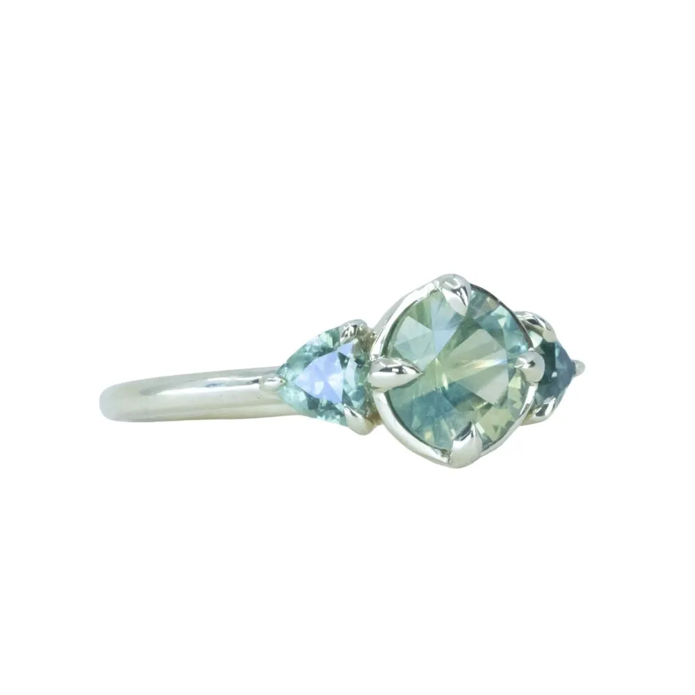 1.28ct Round Parti Teal Green Untreated Montana Sapphire and Trillion Parti Sapphire Low Profile Ring in 14k Green Gold