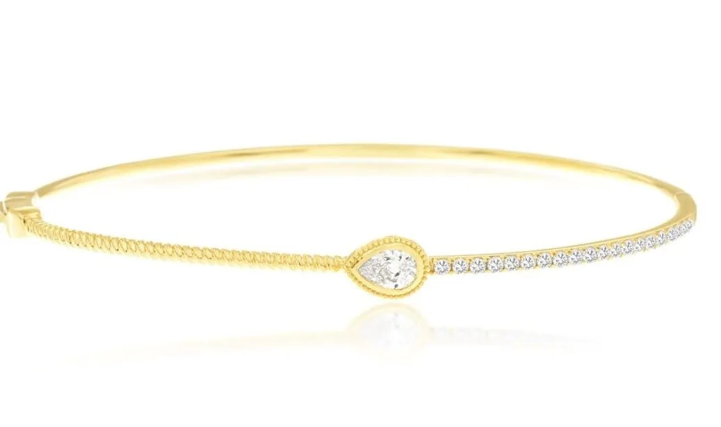 14k yellow gold center pear shaped diamond hinged bangle