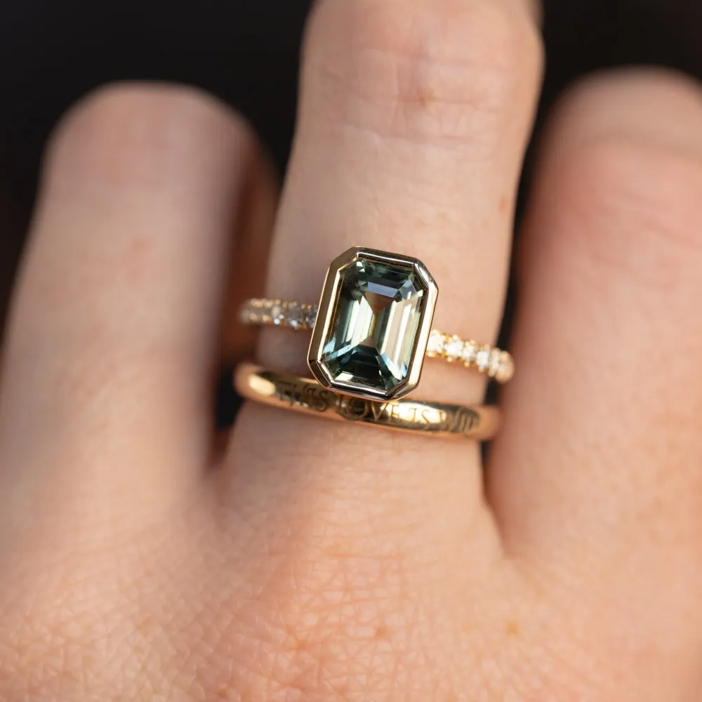 3.02ct Emerald Cut Madagascar Minty Sapphire Low Profile Bezel Solitaire Ring with French Set Diamonds in 14k Yellow Gold