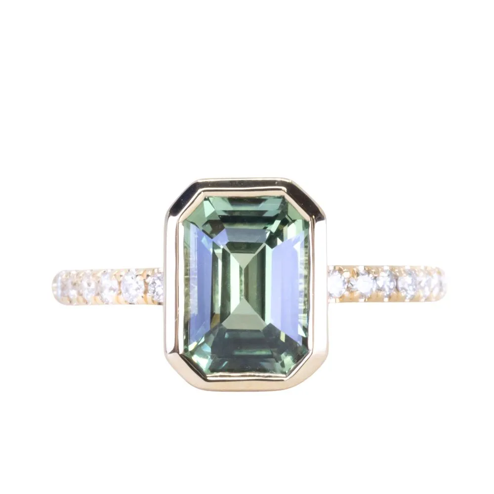 3.02ct Emerald Cut Madagascar Minty Sapphire Low Profile Bezel Solitaire Ring with French Set Diamonds in 14k Yellow Gold