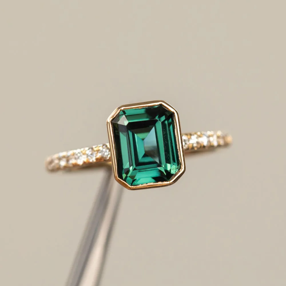 3.05ct Emerald Cut Color Shifting Teal Blue Green Sapphire Low Profile Bezel with French Set Diamonds 18k Yellow