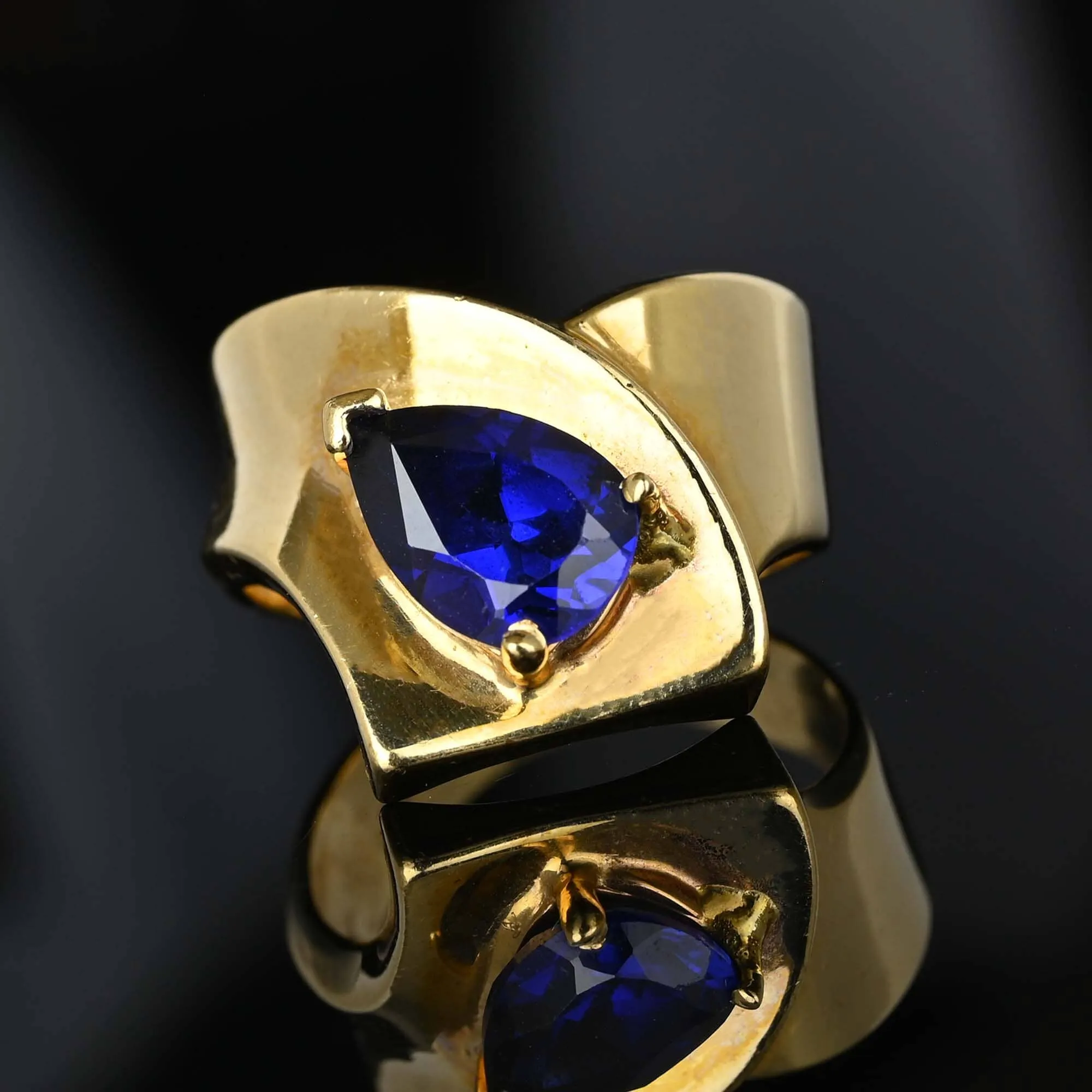 Modernist Wide Gold Cross Over Band Sapphire Ring