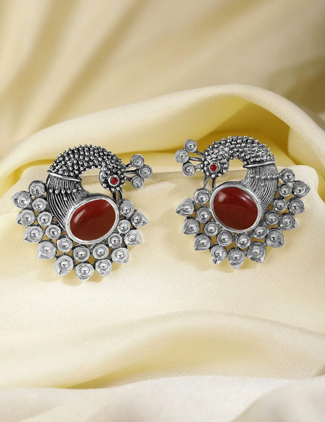 Oxidized Silver Plated Peacock Motif Stud Earrings with Ruby Studded