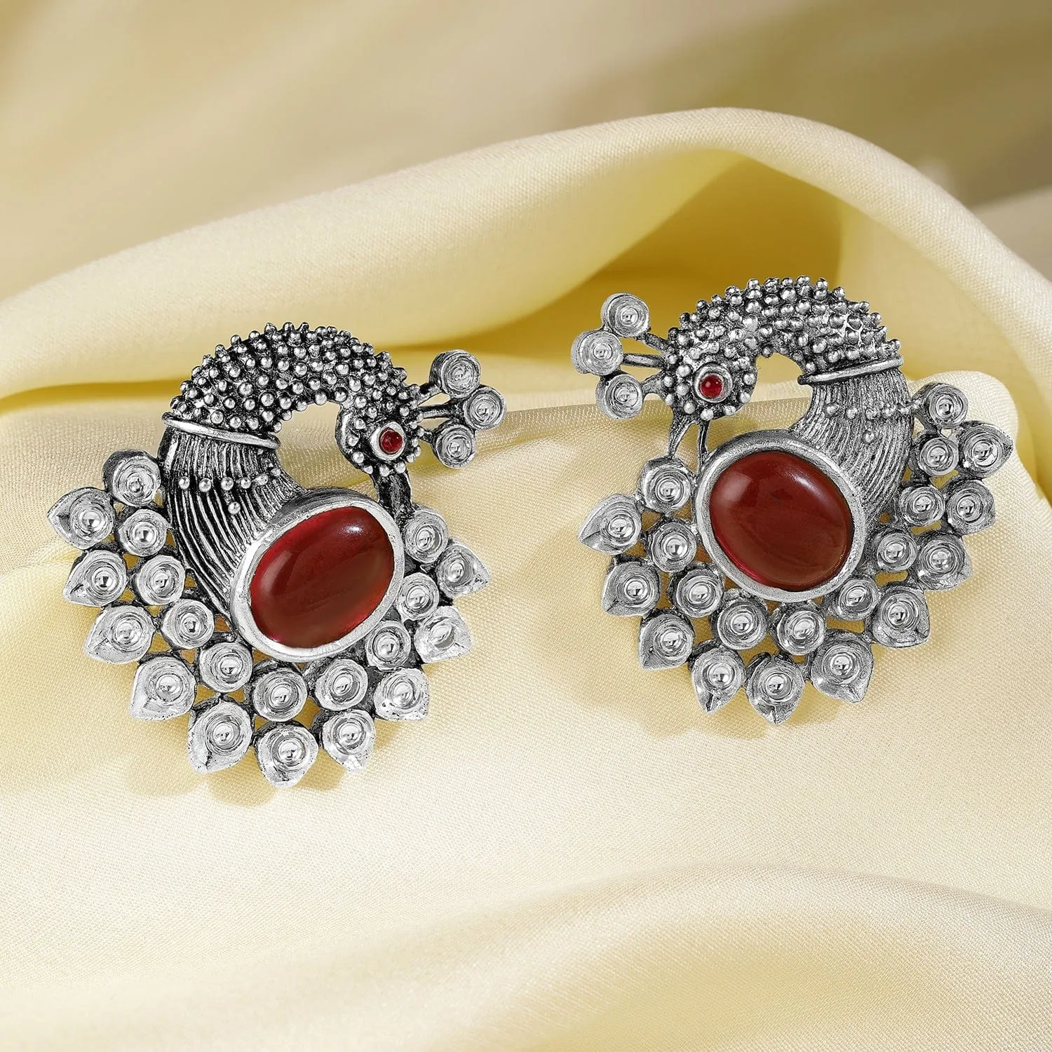 Oxidized Silver Plated Peacock Motif Stud Earrings with Ruby Studded