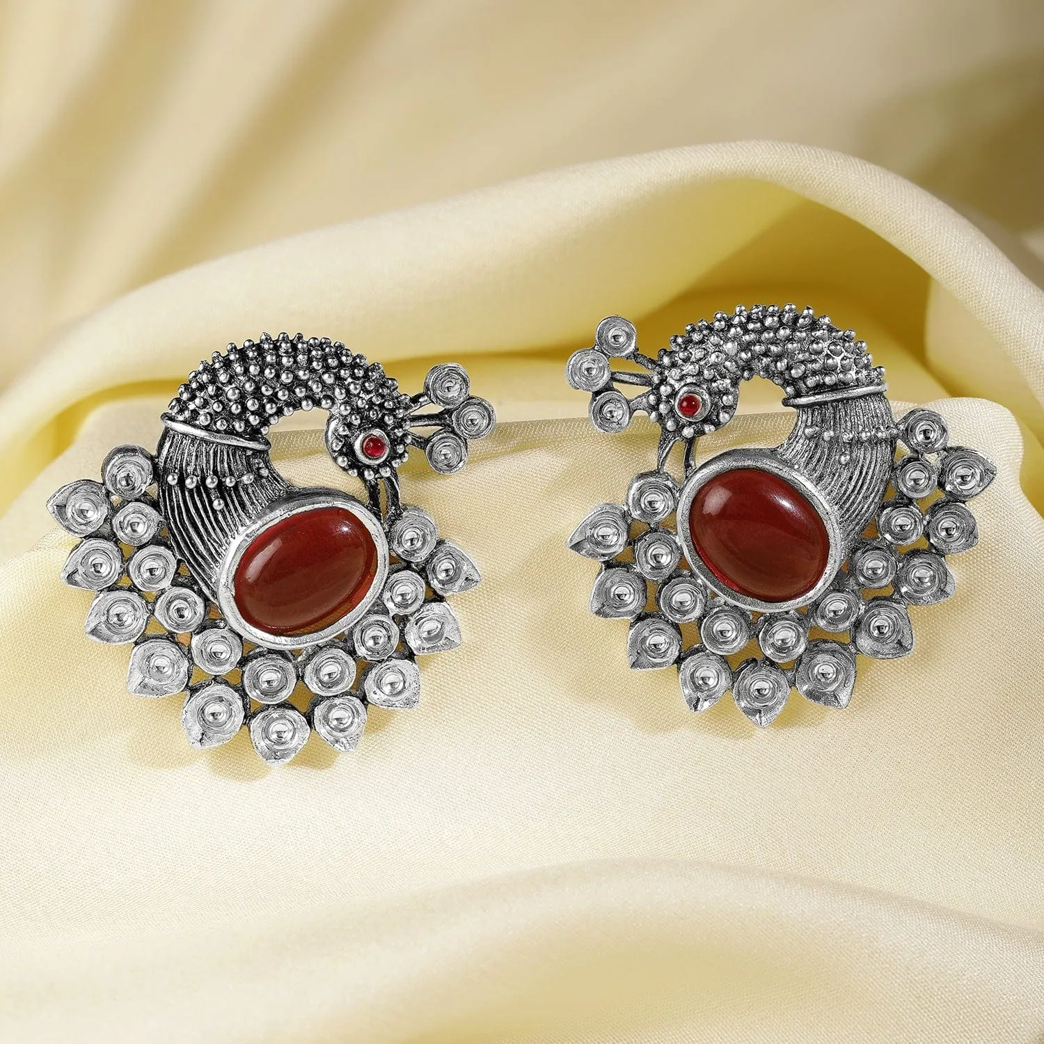 Oxidized Silver Plated Peacock Motif Stud Earrings with Ruby Studded