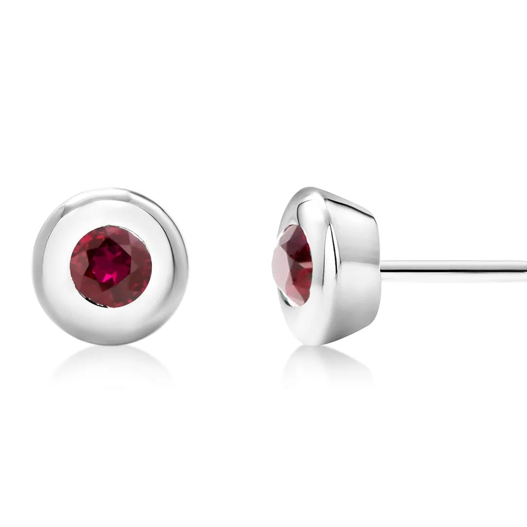 Yellow Gold Bezel Set Ruby Stud Earrings Weighing 0.30 Carat